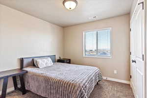 Bedroom with carpet floors