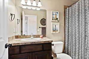 Bathroom featuring toilet and vanity