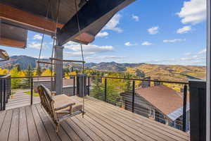 Wooden deck with a mountain view