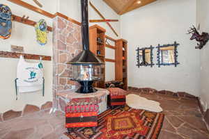 Interior space featuring a wood stove