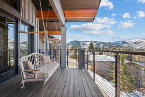 Wooden deck with a mountain view