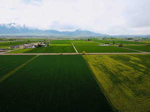 Birds eye view of property featuring a rural view and a mountain view