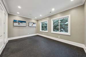 Unfurnished room featuring ornamental molding