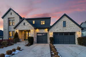 View of front of home featuring a garage