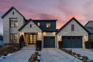 View of front of house with a garage