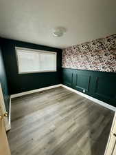 Spare room with light hardwood / wood-style floors