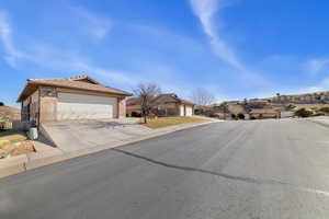 View of front of home featuring a garage