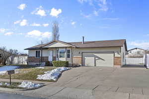 Single story home with a garage