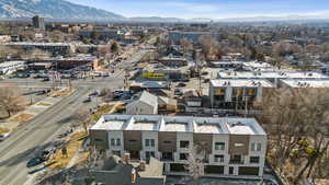 Birds eye view of property with a mountain view