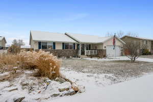 Ranch-style home with a garage