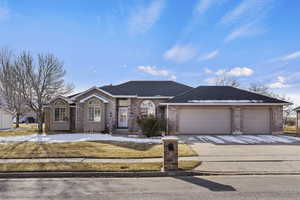 Single story home with a garage