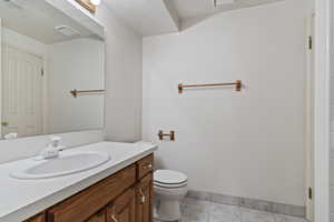 Bathroom with vanity and toilet