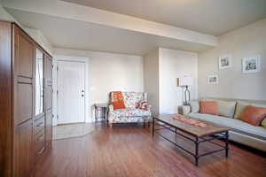 Living room with light wood-type flooring