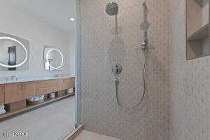 Bathroom with a tile shower