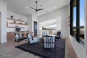 Living room with light wood-type flooring