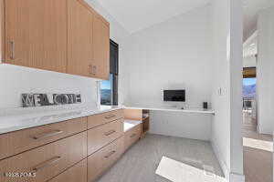 Bathroom featuring vaulted ceiling