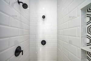 Bathroom with tiled shower