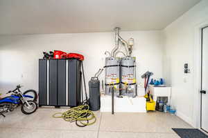 Garage with strapped water heater