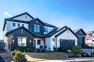 Modern inspired farmhouse with a garage