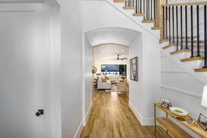 Hallway featuring light wood-type flooring