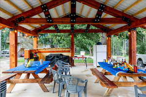 View of patio / terrace featuring a gazebo and a grill