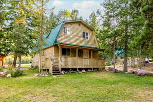 View of front of home featuring a front lawn