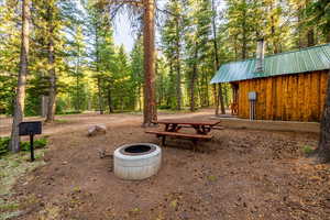 View of yard featuring a fire pit