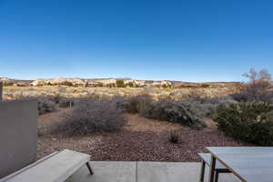 View of yard featuring a patio and a mountain view