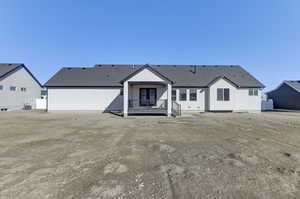 View of front of property featuring central AC unit
