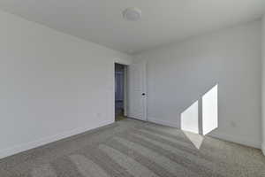 View of carpeted spare room