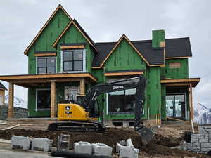 Unfinished property featuring a mountain view