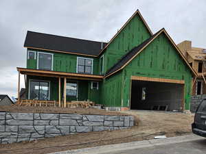 View of front of house featuring a garage