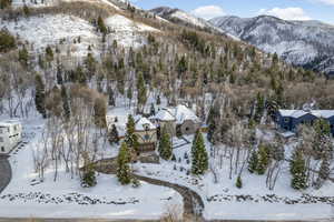 Snowy aerial view with a mountain view