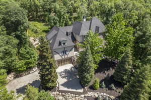 View from above of property with a heavily wooded area