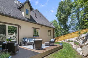 Deck with an outdoor hangout area
