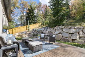 Wooden deck featuring an outdoor living space