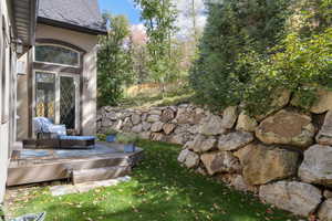 View of yard featuring a wooden deck
