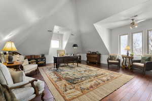 Office area featuring ceiling fan and dark hardwood / wood-style floors