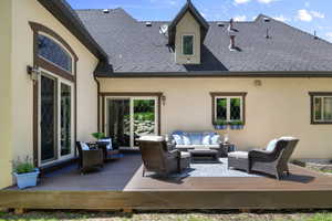 Wooden deck with outdoor lounge area