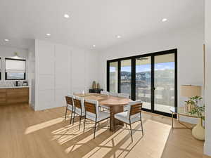 Dining room featuring light wood-type flooring