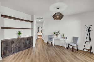 Interior space with light hardwood / wood-style flooring