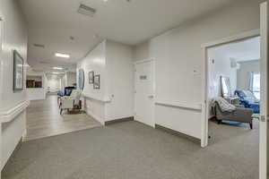 Corridor with carpet floors
