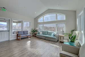 Sunroom / solarium with vaulted ceiling