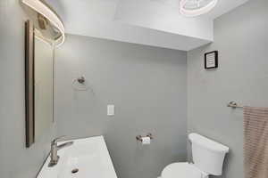 Bathroom with toilet, sink