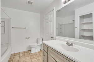 Bathroom with vanity and toilet