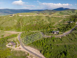 Aerial overview of property's location featuring mountains