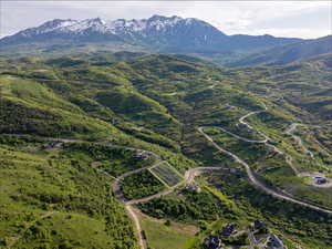 Aerial overview of property's location with a mountainous background
