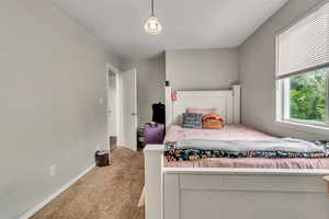 View of carpeted bedroom