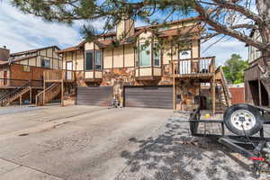 View of front of home featuring a garage