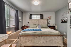 Bedroom featuring carpet flooring